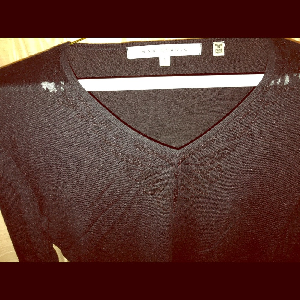 Sweater w/ butterfly detail at the neckline Sz L